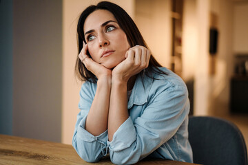 Close up of a beautiful pensive young woman