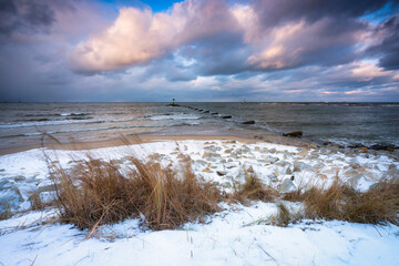 Winter landscape of a snow covered beach at Baltic Sea in Gdansk. Poland