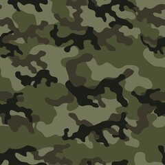 Fototapeta premium Green forest camouflage seamless military texture.