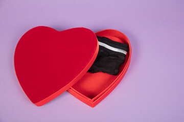 Perfect Valentine's Day gift, black lingerie in a heart-shaped box