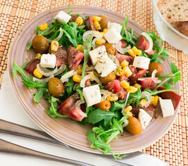 fresh vegetarian healthy vegetable salad with arugula and chees