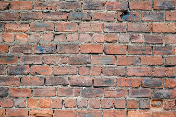 Naklejka premium Close Up of Old Weathered Brick Wall