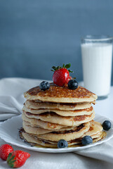 stack of pancakes with berries, pancake, breakfast, food, pancakes, dessert, fruit, sweet, berry, stack, plate, cake, meal, syrup, strawberry, delicious, homemade, honey, raspberry, fresh, white, morn