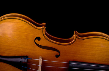 Violin music instrument closeup isolated on black