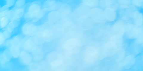 Blue bokeh abstract texture. Blurred bright light at night.