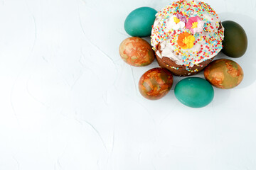 Easter cake and eggs on white background with copy space. Easter