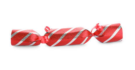 Bright striped Christmas cracker isolated on white