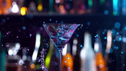 Super slow motion of falling ice cube into cocktail drink, camera movement. Filmed on high speed cinema camera, 1000 fps. - Powered by Adobe
