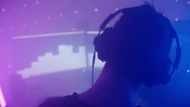 Gamer headbanging around while listening to music 4K