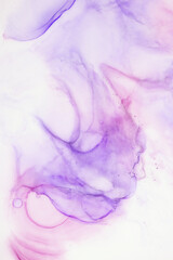 abstract splashes of alcoholic ink in purple