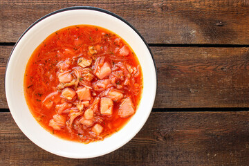 borscht red tomato soup first course bouillon meat and vegetables on the table meal snack keto or paleo diet
outdoor top view copy space for text food background rustic image 