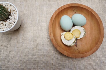 Salted egg is a general term for dishes made from duck eggs that are preserved by salting (salt is too high to deactivate the enzyme breakdown)