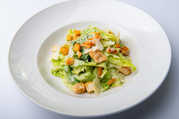 Caesar salad with croutons and mayonnaise