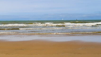 Fototapeta na wymiar Beautiful sea, sand and blue sky in the summer day.
