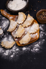 Raw homemade dumpling. Dumplings with potatoes.