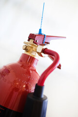 Naklejka premium Top of a fire Extinguisher 