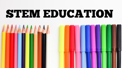 Text STEM EDUCATION on white background with colorful pencils.Educational concept.