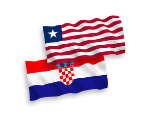 Obraz premium National vector fabric wave flags of Liberia and Croatia isolated on white background. 1 to 2 proportion.