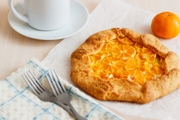 Freshly baked tangetine galette on baking paper
