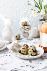 Easter  sweet bread, kulich (cake), quail eggs with white crocuses. Holidays breakfast .