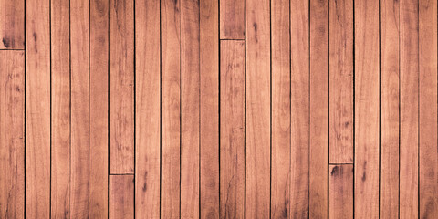 Dark brown wood wall with natural pattern is used for background or design. Old wood wall background
