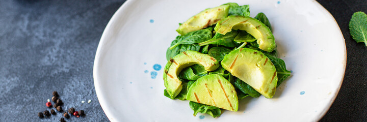 avocado salad fried grilled and lettuce spinach arugula snack barbecue vegetables ready to eat on the table for healthy meal outdoor top view copy space text food background rustic image 