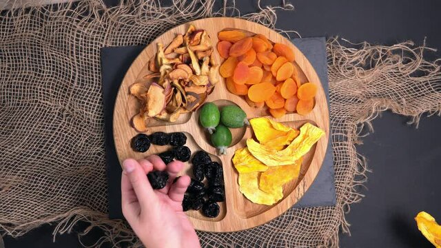 dried fruits top view, the Vegan food. mango, apples, prunes, dried apricots feijoa. healthy snacks