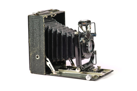 Vintage large format camera on a white background