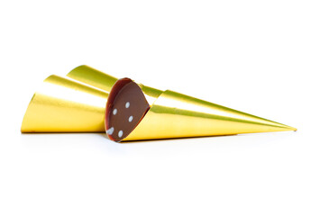 chocolate candy in golden wrapper on white background isolation