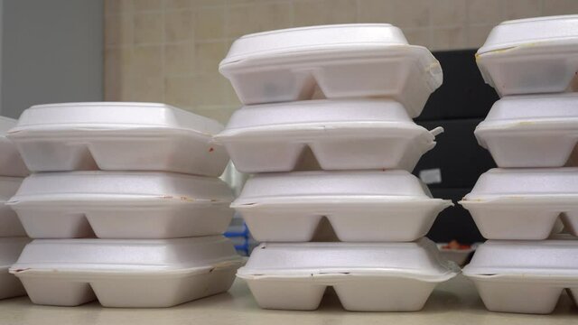 Takeaway food. Online order. Eating takeout amid COVID-19. Meal Prep Containers from the restaurant. Disposable food packaging. Plastic Lunch Boxes
