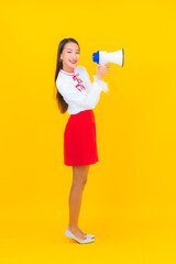 Portrait beautiful young asian woman use megaphone