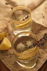 Lemonade with lemon and lavender in rustic style