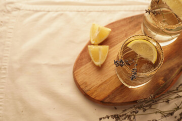Lemonade with lemon and lavender in rustic style