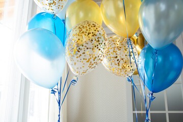 Balloons in blue and gold