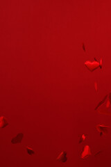 Festive red background for Valentines day with falling hearts
