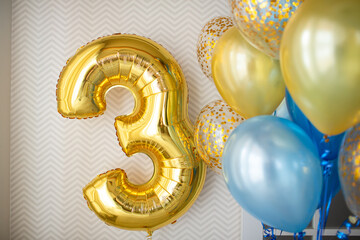 Balloons in blue and gold