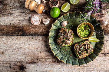 Sandwich with avocado toast with mushrooms and microgreen. Delicious breakfast or snack. Top view, overhead
