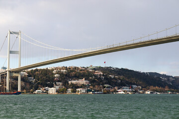 The Bosphorus Bridge,  thus connecting Europe and Asia (alongside Fatih Sultan Mehmet Bridge and Yavuz Sultan Selim Bridge). The bridge extends between Ortaköy (in Europe) and Beylerbeyi (in Asia).