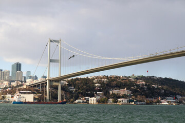 The Bosphorus Bridge,  thus connecting Europe and Asia (alongside Fatih Sultan Mehmet Bridge and Yavuz Sultan Selim Bridge). The bridge extends between Ortaköy (in Europe) and Beylerbeyi (in Asia).