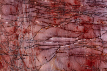 Natural quartzite background in perfect red tone.