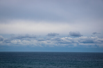 Naklejka na ściany i meble clouds over sea