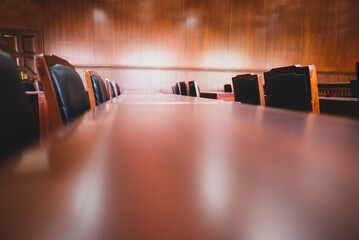Table and chair in the courtroom of the judiciary.