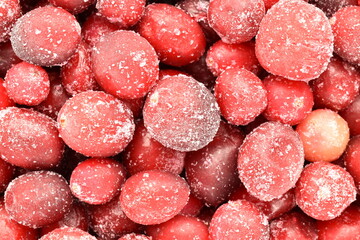 Freshly frozen red organic cranberries, close-up, top view.