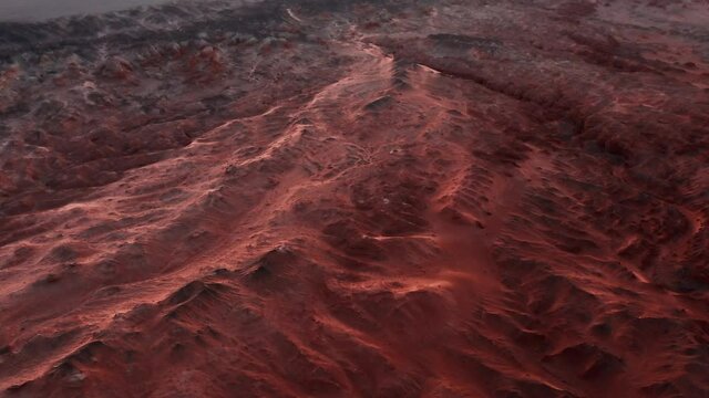 Martian landscape, Flaming Cliffs aerial view in the Gobi Desert. Scorched earth where the remains of dinosaurs rest, and the laying of their eggs. Mongolia. Canyon Hermen-Tsav.