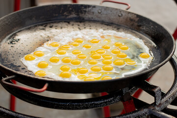 Hamburger eggs being prepared at the street food festival.
