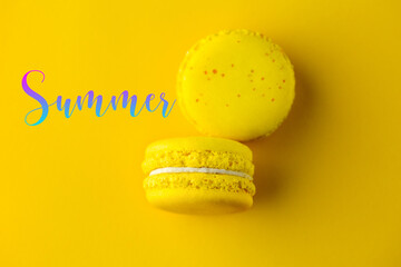 Yellow macaroons on a yellow background. Yellow sweets. Yellow background. Macaroons close-up. Top view of macaroons. macaroons.  