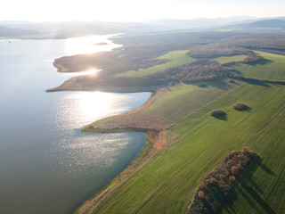 Aerial sunset view of Trakiets Reservoir, Bulgaria