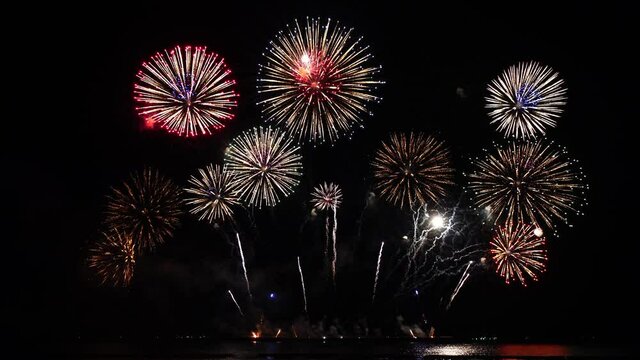 Colorful fireworks display night background. New Year Firework 4k resolution
