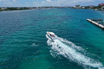 Boat leaving Harbor in The Bahamas