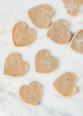 baking heart shaped cookis for St. Valentine's Day 
